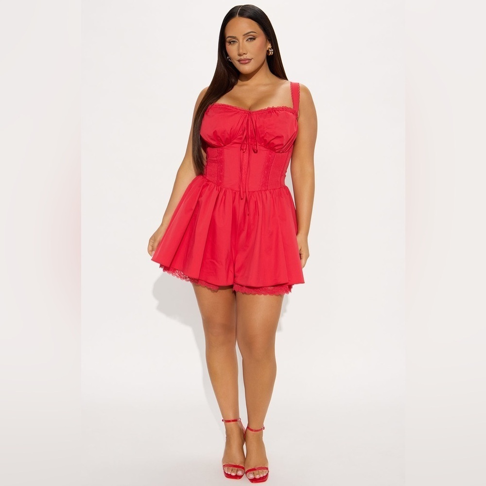 New with tags Fashion Nova Red romper ruffle bottom/flare corset back bow detail